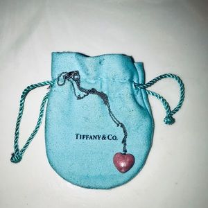 Authentic Tiffany solid heart with silver chain.